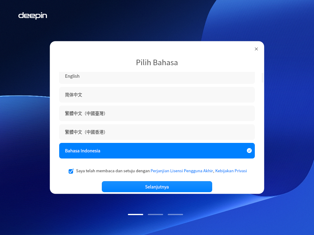 Layar Pilih Bahasa Deepin yang sama dengan kotak centang persetujuan lisensi sudah tercentang biru