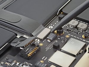Langkah 3 — Lepaskan Kabel Trackpad
