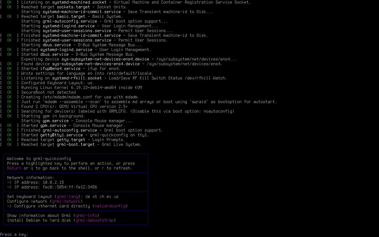 Layar grml-quickconfig GRML berisi alamat IP, pilihan tata letak keyboard, dan daftar perkakas termasuk grml-debootstrap