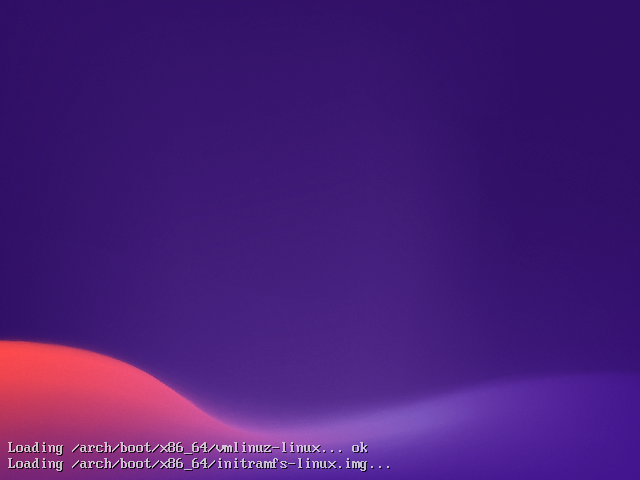 Layar loading kernel EndeavourOS bertuliskan Loading arch/boot/x86_64/vmlinuz-linux dan initramfs-linux.img di atas latar gradasi ungu ke merah muda