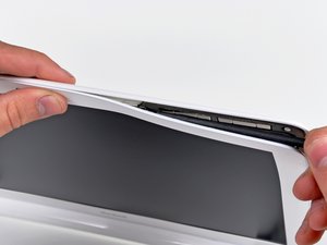 Langkah 2 — Mengangkat Bezel Depan dari Sisi Atas